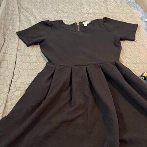 Timeless Black Fit-and-Flare Dress with Zip Detail